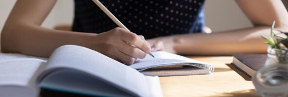 Young Student Girl Writing Notes